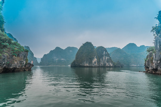 Misty Halong Bay.  Rock formations in the middle of the sea. 
