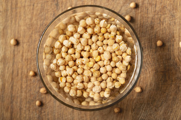 Chickpea, dry chickpeas beans in water in bowl, legume chickpea  