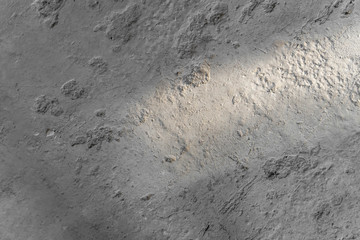 Streak of light on the concrete floor, background and texture.