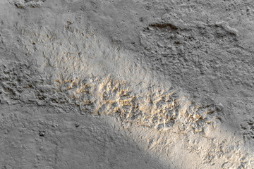 Streak of light on the concrete floor, background and texture.