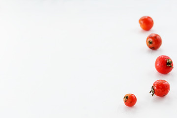 Ugly rotten tomatoes on a light background. Horizontal orientation, copy space.