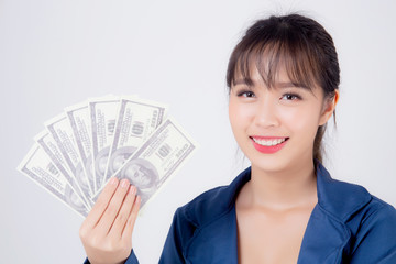 Beautiful portrait young business asian woman holding money isolated on white background, businesswoman showing banknotes with excited, happy girl income with profit finance and success concept.