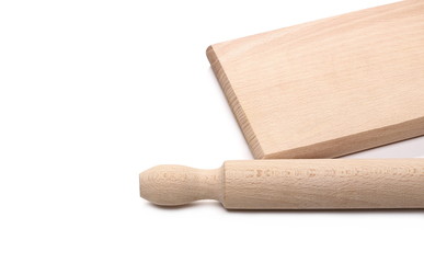 Wooden rolling pin and chopping board isolated on white background 