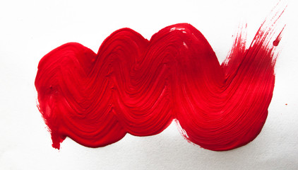 Red abstract brush stroke on white background