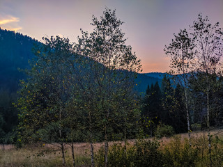 Landscape with Carpathian mountains during the sunset with amazing sunlight