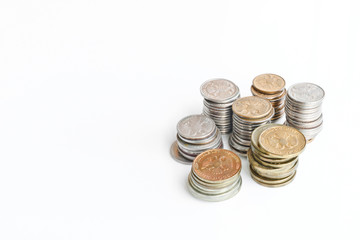 Columns of coins of Russian rubles on a white background. Outdated Russian currency. Double-headed eagle on the back of coins. Copy