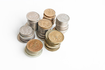 Columns of coins of Russian rubles on a white background. Outdated Russian currency. Double-headed eagle on the back of coins. Copy