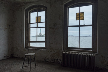 Statue of Liberty through the window of Ellis Island Hospital