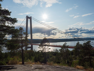 Summer view of the High coast bridge Hogakustenbron seen from the north bank of the river Angermanalven located near Harnosand in Vaesternorrland, Sweden.