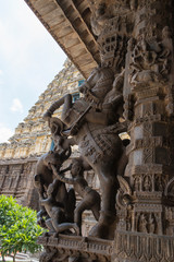 Knight on a horse statue against a column of the entrance of the worship area inside the Vellore...
