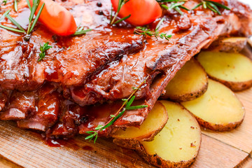 Close up Mouth Watering Juicy Grilled Pork Rib Meat on Top of Wooden Cutting Board