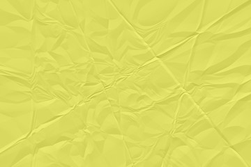 Fototapeta premium crumpled yellow paper background close up