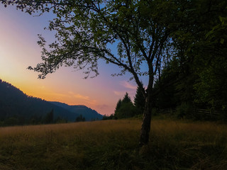 Fototapeta na wymiar Landscape with Carpathian mountains during the sunset with amazing sunlight