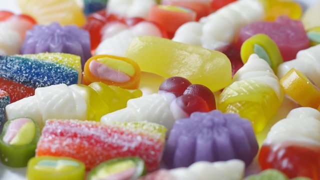 A lot of assorted mixed candies rotation. Colorful sweets