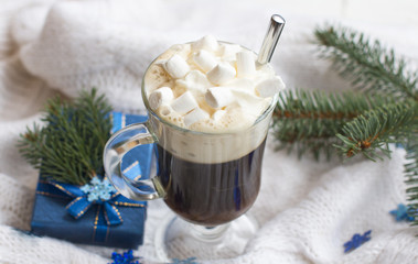 Hot coffee with cream and marshmallow cold winter at Christmas. The new year 2020.