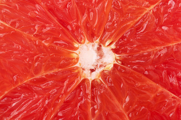 Grapefruit pulp close up. Citrus fruit background