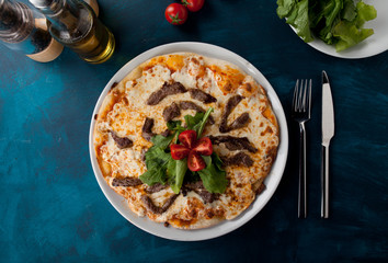 pizza with beef and cheese