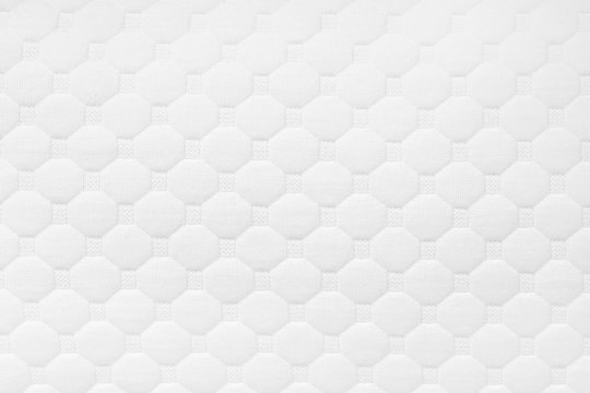 Background of soft comfortable quilted white pillow