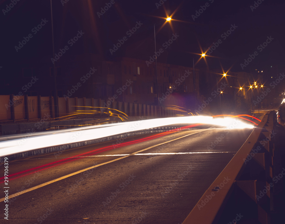 Wall mural night city traffic lights long exposure on independence street (strada independentei), bartolomeu br