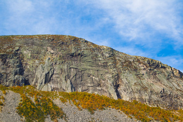 Rock and Colorful Autumn Foliage of White Mountains in New England