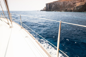 Fototapeta premium White sailing yacht deck with railings and ropes
