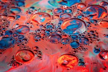 Color paint drops in water. Ink swirling underwater.