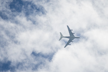 Large four-bladed aircraft, just captured from below.
