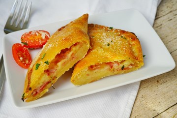 Ham and cheese kourou, a Greek savory pie