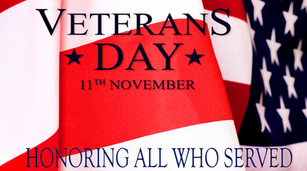 Veterans day background. Text veterans day 11 th november. United States of America flag  with the inscription honoring all who served.