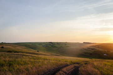 Naklejka na ściany i meble Valley at sunset in rural Moldova