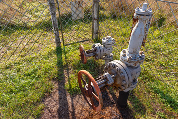 Images of natural gas transportation equipment, including large diameter and high pressure pipes, as well as pipeline maintenance points, which are protected.