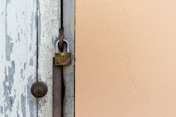 Close up old lock on the door