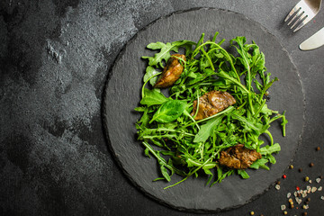 healthy salad with liver (tasty appetizer) menu concept. food background. copy space. Top view