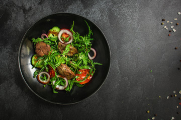healthy salad with liver (tasty appetizer) menu concept. food background. copy space. Top view