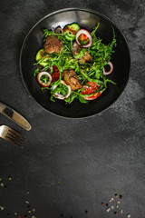 healthy salad with liver (tasty appetizer) menu concept. food background. copy space. Top view