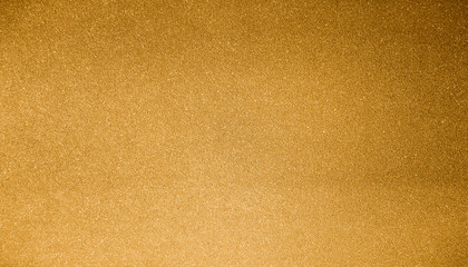 Gold color concrete wall background for texture
