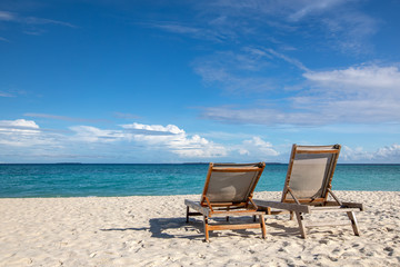 chairs on the beach of hanimaadhoo (maldives)