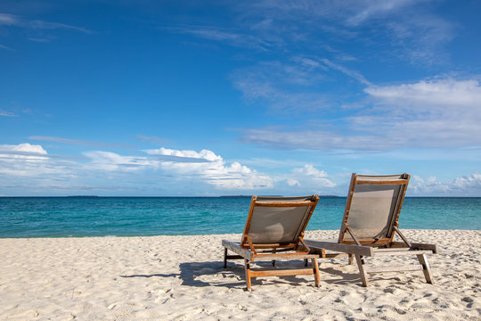 chairs on the beach of hanimaadhoo (maldives)