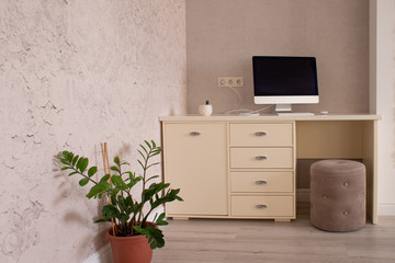 Workplace with a computer in the interior