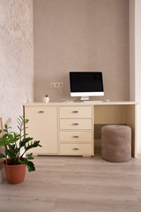 Workplace with a computer in the interior