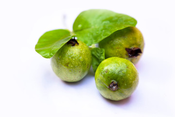 Fresh guava with leaf isolated on white background.