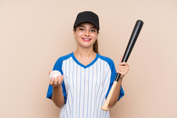 Young girl playing baseball over isolated background