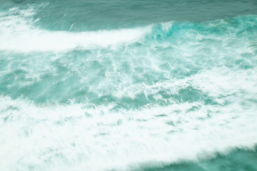 Sea water wave, abstract motion, long exposure, turquoise, blurred texture, background