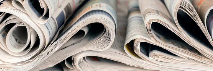 Foto op Canvas Newspapers, world news information concept, close-up, panoramic © Aleksey 159