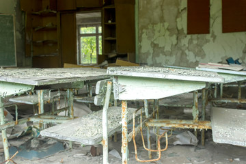The ruins of the school. The destroyed class in the school Chernobyl exclusion zone.