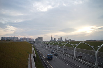 Expressway in the city on an autumn evening