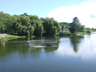 Fountain in the pond Czech summer