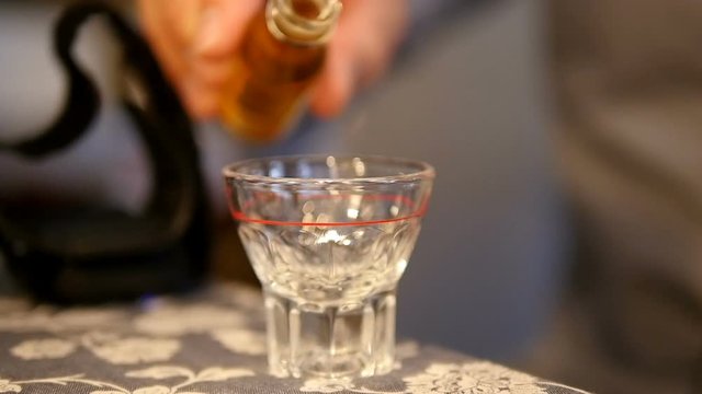 Slow motion Pouring a glass of Rattenkiller - Hameln, Germany - September 2017