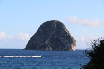 Fototapeta na wymiar Rock in the sea - Diamond rock