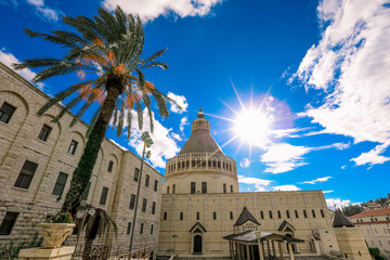 The Chirst Church under the Cloudy Blue Sky with the Palms, Nazareth, Israel - obrazy, fototapety, plakaty